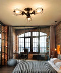 Bedroom with vintage industrial ceiling light with metal wire cage shade, 3 light chandelier in rust color installed