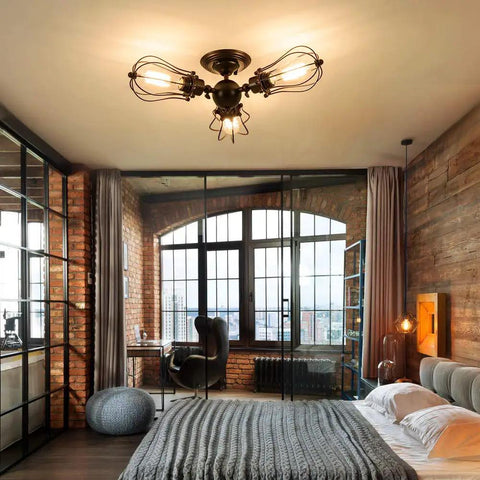 Bedroom with vintage industrial ceiling light with metal wire cage shade, 3 light chandelier in rust color installed