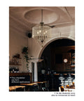 17 Inch Black Crystal Chandelier With Matte Black Frame Modern Mid Century Pendant Light Fixture E12 Base in elegant dining area