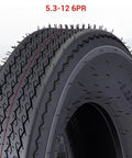 Close-up of Two Pack All Weather Rugged Heavy Duty Trailer Tire Set 5.30-12 6PR Load Range C, showing tread and construction.