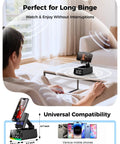 Person using Induction Phone Stand With Bluetooth Speaker HD Sound Dope Gift For Him Dorm Essentials Anti Slip Phone Holder Gadget