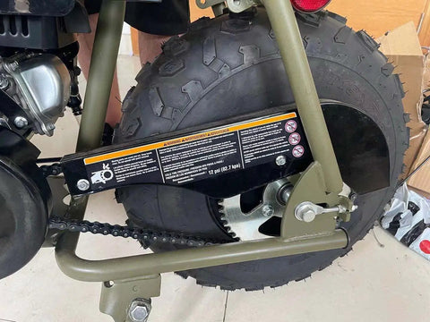 Side view of mini bike showing the 15mm Chain Tensioner Adjuster Bolt On Upgrade for Predator 212cc 196cc 6.5HP and tire