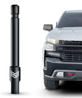 Five Inch Flexible Truck Antenna For Chevy Silverado And GMC Sierra 2014 And Up Anti Theft Carwash Safe Short Replacement displayed next to Chevy truck front view