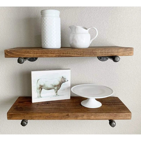 6 Pack 10 Inch Wall Mounted Industrial Pipe Clothing Rack Set supports wooden shelves with decorative items on display
