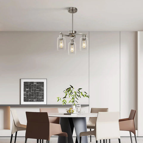 Three Light Brushed Nickel Pendant Chandelier For Kitchen Island, Modern Industrial Hanging Lamp With Clear Glass Shade, Adjustable Ceiling Fixture For Dining Room above dining table.