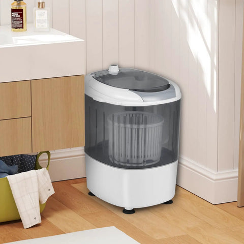 Slick Compact Mini Washer And Dryer Combo, 5.5 Pound Portable Laundry Rig in sharp grey placed in a corner of a small space.