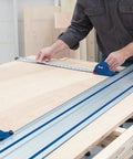 Using Adaptive Cutting System Parallel Guides For Track Saws ACS415 for precise woodworking on a large sheet in a workshop