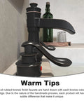 Waterfall Widespread Bathroom Faucet With Oil Rubbed Bronze Farmhouse Finish 8 Inch Spread Twin Handle 3 Hole Design Pop Up Drain Stopper Including Overflow And Supply Lines Vanity Lavatory Sink Parts For Easy Install featuring close-up of spout and handles in bathroom setting