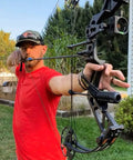 Archery demonstration with Dragon X7 Ready To Hunt Compound Bow Kit For Adults, 0-70 Lbs Draw, outdoor setting
