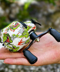 Spincast Fishing Reel Size 30 With Right Or Left Hand Retrieve 3 9 To 1 Gear Ratio Pre Spooled With Line shown in a hand