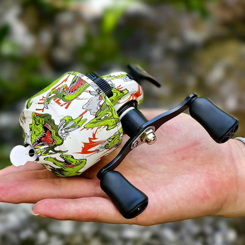Spincast Fishing Reel Size 30 With Right Or Left Hand Retrieve 3 9 To 1 Gear Ratio Pre Spooled With Line shown in a hand