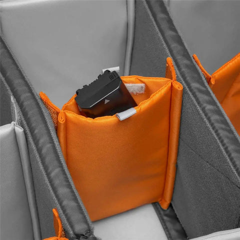 Interior of Pro Trekker BP 550 AW II Backpack for Pro Photogs and On The Go Travelers showing orange modular gear pocket.
