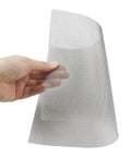 Hand holding flexible sheet from Stainless Steel Bumper Repair Mesh Kit 16 Pcs For Automotive Restoration DIY Friendly