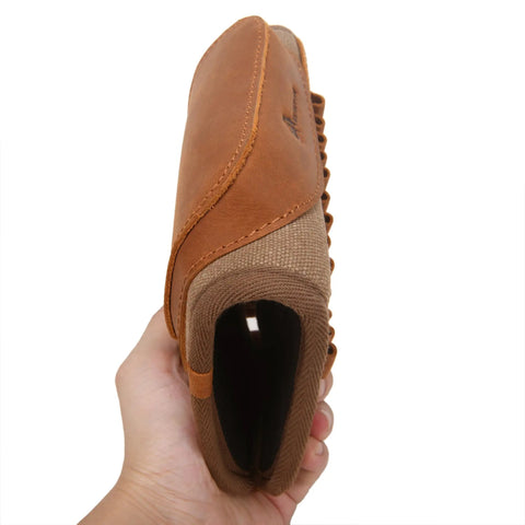 Profile view of Rugged Leather And Canvas Gun Buttstock Cheek Rest Riser With Shell Holder For Scoped Rifle Brown Color One Inch Cheek Pad