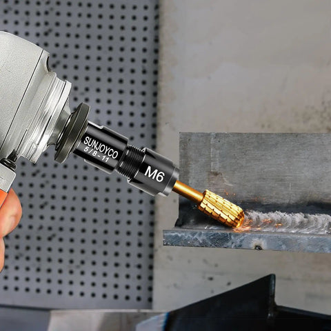 Close-up of Angle Grinder To Die Grinder Adapter Kit With Five Eighths Inch Eleven Thread Spindle in use on metal surface