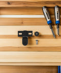 Heavy Duty Glass Door Pivot Hinge in Stainless Steel for Bathroom Shower Doors Premium Finish shown with tools on wood surface