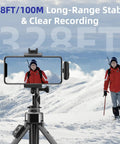AI Noise Cancellation Wireless Lavalier Microphone For iPhone And Android with tripod and phone recording a skier in snowy mountains.