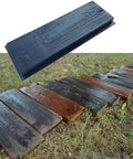 Wooden Board Molds For Concrete DIY Garden Pathways Two Piece Stepping Stone Molds showing installed outdoor path on grass.