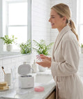 Woman using 2-In-1 Ultrasonic Retainer And Jewelry Cleaner With 46KHz Deep Cleaning Power Portable Dental Cleaning Pod