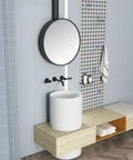 Matte Black Wall Mount Bathroom Faucet With Dual Handles, Solid Brass Construction, wall-mounted over a modern sink