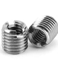 Two metal slotted self-tapping threaded inserts; steel, for automotive and rail vehicle applications
