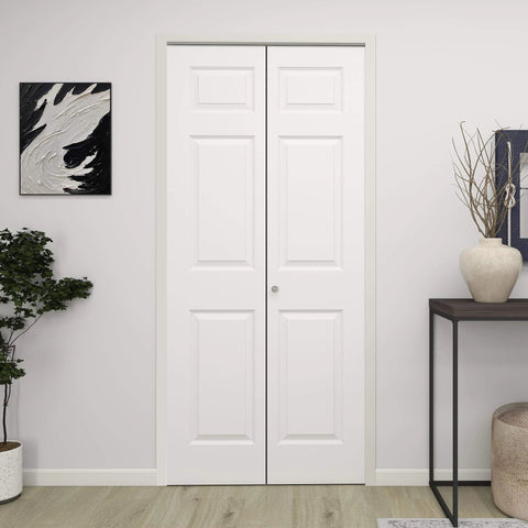 36 Inch By 80 Inch Bifold Barn Door With 6 Panels, White Primed Hollow Core Interior Door Ready To Paint installed in a room