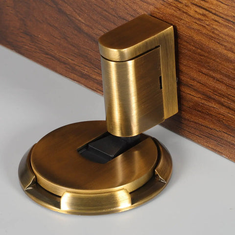 Adjustable Door Stop With No Drill Or Adhesive Mounting, Easy Install Heavy Duty Zinc Alloy Wall Protector close-up on wood surface