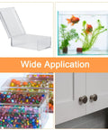 Pair Of Hella Durable Acrylic Hinges For Cabinets Drawers And Displays 75X45Mm Self Adhesive Black Piano Folding Hinges For Diy Crafts And Home Makeover in use with a clear storage box, fish tank, and beads.