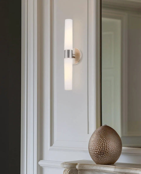 Duo 21 Inch Modern Wall Sconce With Frosted Glass Cylinder Shades Linear Two Light Silver Wall Light In Brushed Nickel Finish mounted vertically