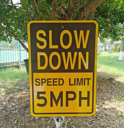 Low And Slow Speed Limit 5 Mph Reflective Aluminum Warning Sign For Driveway Entrance Outdoor Traffic Control view showing yellow and black signage.