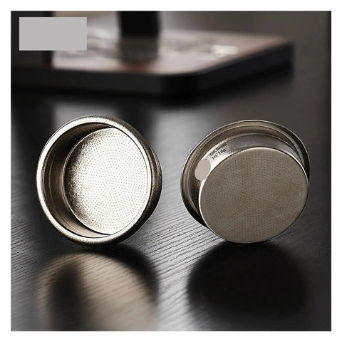 Dope Titanium Espresso Distributor And Ground Leveling Tool For Even Coffee Bed Prep In 58.5mm Portafilter Baskets shown from the side on a dark surface.
