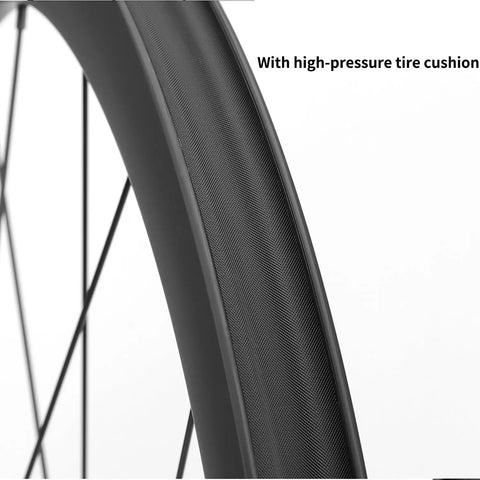 Close-up of Carbon Fiber Road Wheelset Pro Grade 700C rim with center lock disc brake and 24-hole design, showing tire cushion.