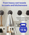 No Drill Suction Cup Hooks For Shower And Bathroom 4 Pack Strong Hold Towel Hooks holding towel and brush on glass