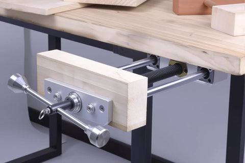 Rock Solid 11 Inch Front Mounted Woodworking Vise with aluminum build and wooden jaws, ideal for heavy-duty clamping tasks.