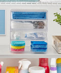 Clear Drawer Organizer With Four Wide Drawers For Office, Kitchen, Beauty, Makeup, Pens And Jewelry Storage Solution, Space Saving, Durable BPA Free Plastic, Stackable, Made In USA filled with towels and sponges