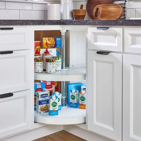 Smooth Spinning Two Tier Pie Cut Plastic Lazy Susan For Corner Base Cabinets 28 Inch Wide showing organized pantry goods in white cabinet
