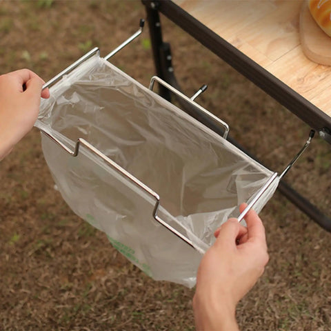 Person assembling Sturdy Stainless Iron Trash Bag Holder Rack For Hanging Use Desktop Or Campin Dustbin Cage Garbage Bag Holder