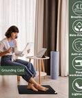 Woman using All In One Grounding Mat Kit With 15Ft Cord for Foot Mats, Computer Desk, Sleep Mat; skin safe, pet friendly surface