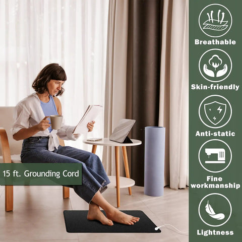 Woman using All In One Grounding Mat Kit With 15Ft Cord for Foot Mats, Computer Desk, Sleep Mat; skin safe, pet friendly surface
