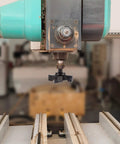 Heavy Duty CNC Spoilboard Surfacing Router Bit Workhorse With 3 Inch Cutting Diameter And One Half Inch Shank attached to machine