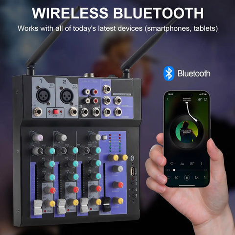 Beast 4 Channel DJ Mixer With Dual Wireless Microphones Bluetooth MP3 Player USB Interface 48V Phantom Power shown with phone