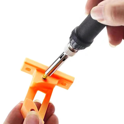 Using Six Piece Heat Set Insert Tool Kit With Soldering Iron Tips For Thread Inserts M2 To M6 All In One Heat Tool For 3D Printers on plastic.