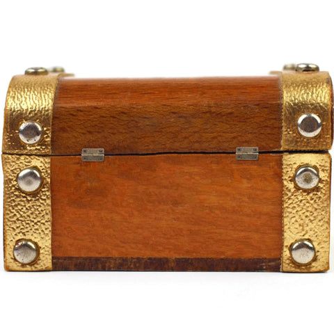 Wooden box with antique copper finish miniature one point two inch folding cabinet hinges at the edges, closed view.