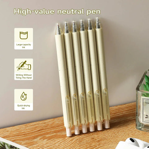 Beige Cream Gel Pens 12 Pack Set With Neutral Aesthetic Retractable Black Ink 0.5mm Fine Point on desk
