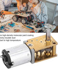 DC gear motor with brass gearbox and metal housing.