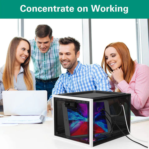 Group working around a black lockable medication storage box with code, holding electronic devices in an office setting.