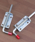 Premium Stainless Steel Spring Loaded Gate Latch And Bolt Hardware Set For Utility Dump Trailers Barn Doors close-up view of spring latch mechanism.