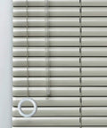 One Hundred Piece Bulk Stash Of Crisp Clear Plastic Roman Blind Curtain Rings in use with smooth cord guide on blinds.