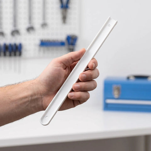 Hand holding Heavy Duty Drawer Slides With Mounting Screws, White Plastic And Metal Rails, for cabinet installation