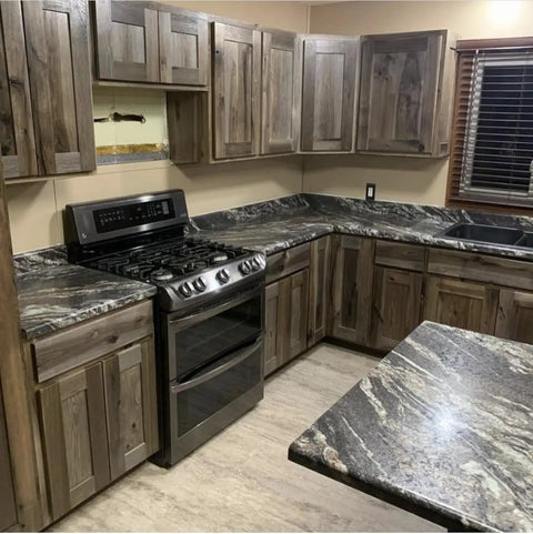Kitchen featuring Buckwild Aging Wood Stain Drops Real Barnwood Charm On Any Deck Making Weathering A Hassle Free Experience with gray brown counters.
